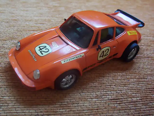 porsche naranja exin