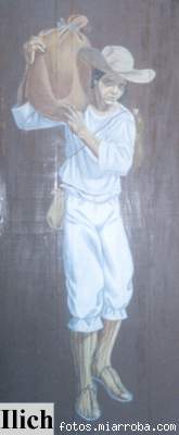 Joven con su carga (Pintura de Ilich en las puertas del Hotel de Montaa Selva Negra