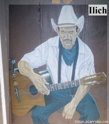 Guitarrista Jinotegano (Pintura de Ilich en las puertas del Hotel de Montaa Selva Negra)