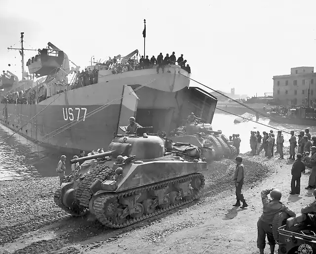 Shermans_disembarking_from_LST_at_Anzio