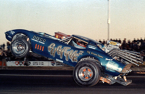 Tommy McNeely puts it sky high in the Fugitive Corvette. Photo thanks to Drag Racing Memories
