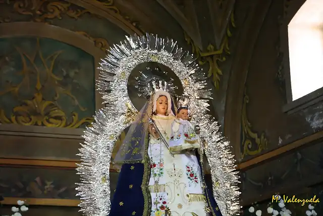 003, la Virgen, marca