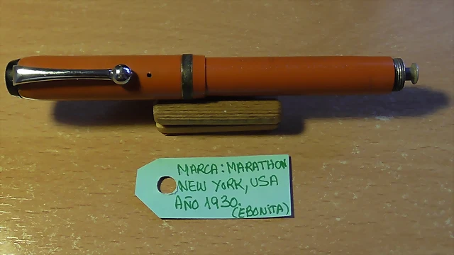 plumas de ebonita naranja 017