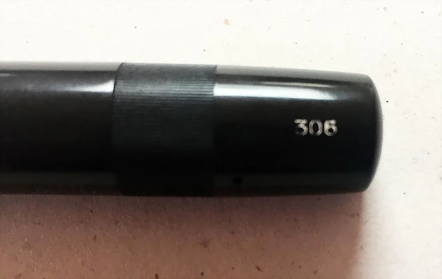 306b