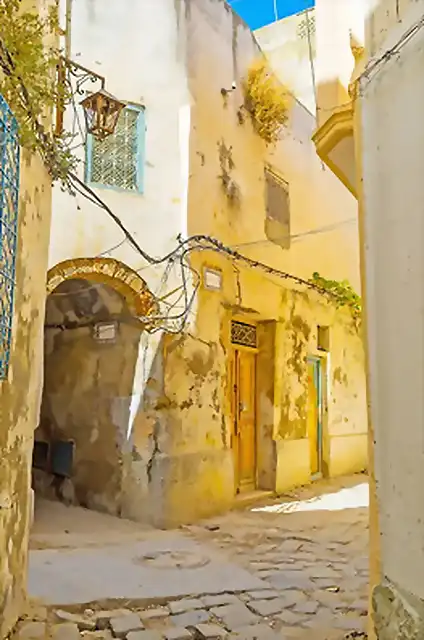 depositphotos_302784024-stock-photo-in-backstreet-of-bizerte-medina