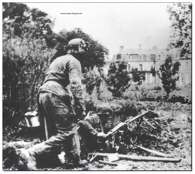 waffen-SS-fighting-british-soldiers-caen-normandy-1944[1]