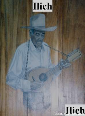 Anciano Guitarrista (Pintura de Ilich en las puertas del Hotel de Montaa Selva Negra)