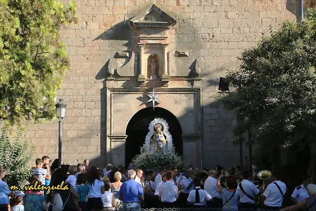 16, la Virgen en la puerta, marca