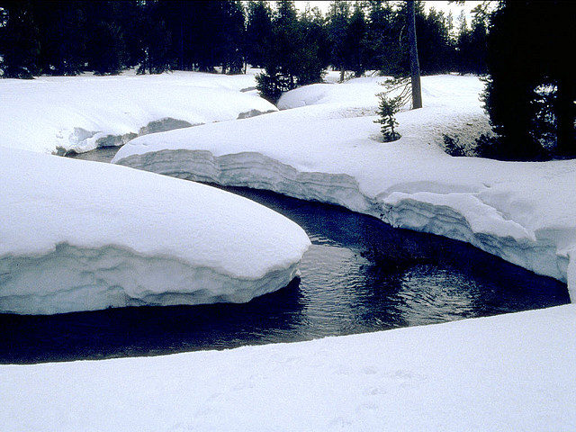 26068 - Creek cutting through snow