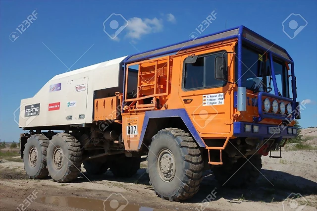 12690988-man-rally-truck-at-offroad-competition