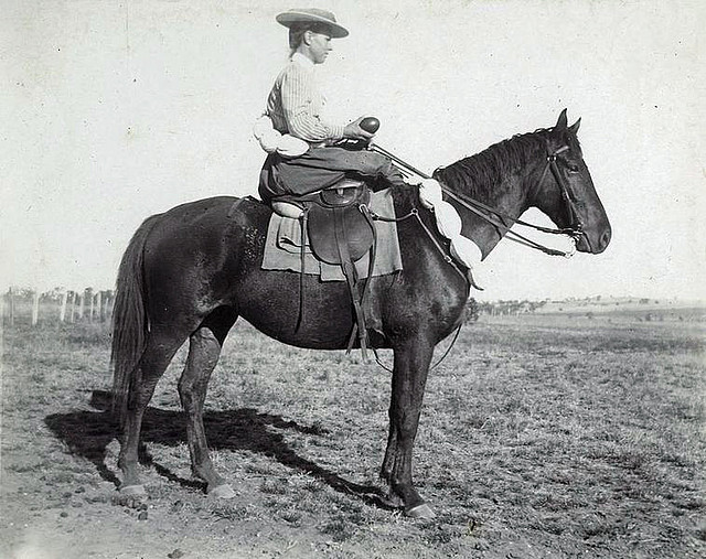 757px-StateLibQld_1_255100_Woman_on_horseback_carrying_emu_eggs,_Blackall_district,_1908