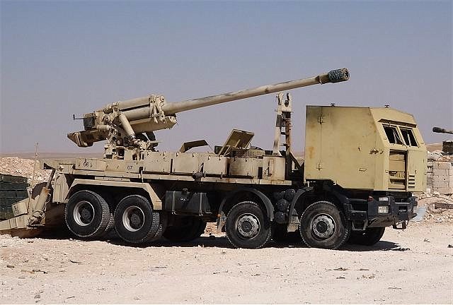 Syrian_military_forces_produced_locally_130mm_M-46_8x8_self-propelled_howitzer_640_001