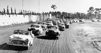 Curtis_Turner_and_Herb_Thomas_head_the_field_for_a_1954_NASCAR_Grand_National_race_1954_at_Jacksonville_Speedway_Park
