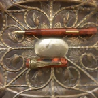 mini plumas 075