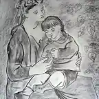 Madre con su hijo en los brazos
