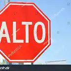 stock-photo-traffic-sign-in-spanish-alto-and-english-english-96957611