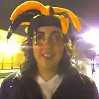 Con el gorrito de bufn y el pelo rizado...jeje, qu pintas!!!