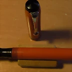 plumas de ebonita naranja 022