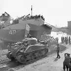 Shermans_disembarking_from_LST_at_Anzio