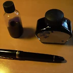 caja plumas y bote cristal tinta 013