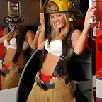 2354779-girl-model-dressed-in-fire-fighter-gear-bra-showing-on-fire-engine-Stock-Photo