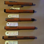 plumas de ebonita naranja 001