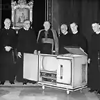 Angello Dell Acqua Inspecting a Television