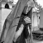 2406669-black-and-white-image-of-a-praying-woman-sculpture-in-parisian-cemetery-of-pere-lachaise