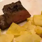 COSTILLAS CON PATATAS.