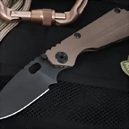 strider-sng-coyote-tan-black-blade-3-4-grinds-folding-knife-1