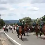 por la carretera