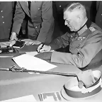 Field_Marshall_Wilhelm_Keitel,_signing_the_ratified_surrender_terms_for_the_German_Army_at_Russian_Headquarters_in..._-_NARA_-_531290.tif