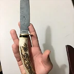 navaja en mano