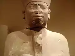 455px-MentuhotepII-FuneraryStatue-CloseUp_MetropolitanMuseum_c