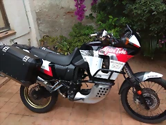 AT