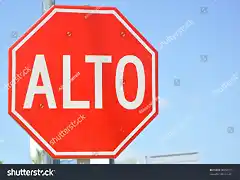 stock-photo-traffic-sign-in-spanish-alto-and-english-english-96957611