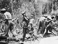 British troops firing a mortar on the Mawchi road. July 1944,