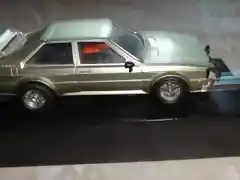 Audi Quattro cromo, y con peana tipo M1 20 aniversario.1