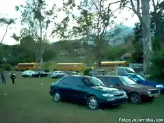 fila de buses de empleados en santa fe