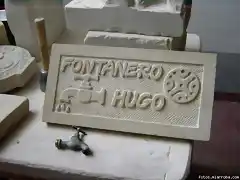 Cartel de piedra para el negocio de un autnomo.