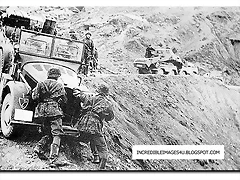 troops of the Leibstandarte SSAdolf Hitler negotiate difficult terrain in Greege.german-invasion-crete-1941-003