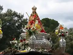 la Virgen cerca