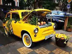 old-retro-lemon-car-design-car-near-restaurant-old-retro-lemon-car-181755248