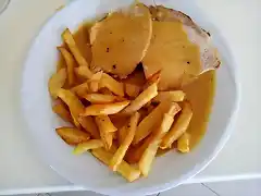 Lomo de cerdo con patatas fritas
