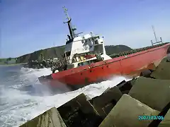 con la mar se va arrimando