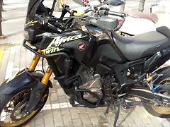 AT
