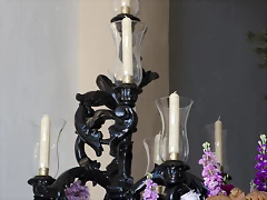 Candelabro guardabrisa