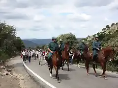 por la carretera