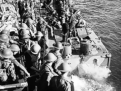 Troops of the Cameron Highlanders of Canada in landing craft prior to raid on Dieppe.