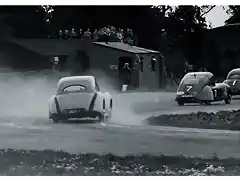 Woodcote Corner 1948 the field chases the eventual winner of Goodwood's first race Paul Pycroft